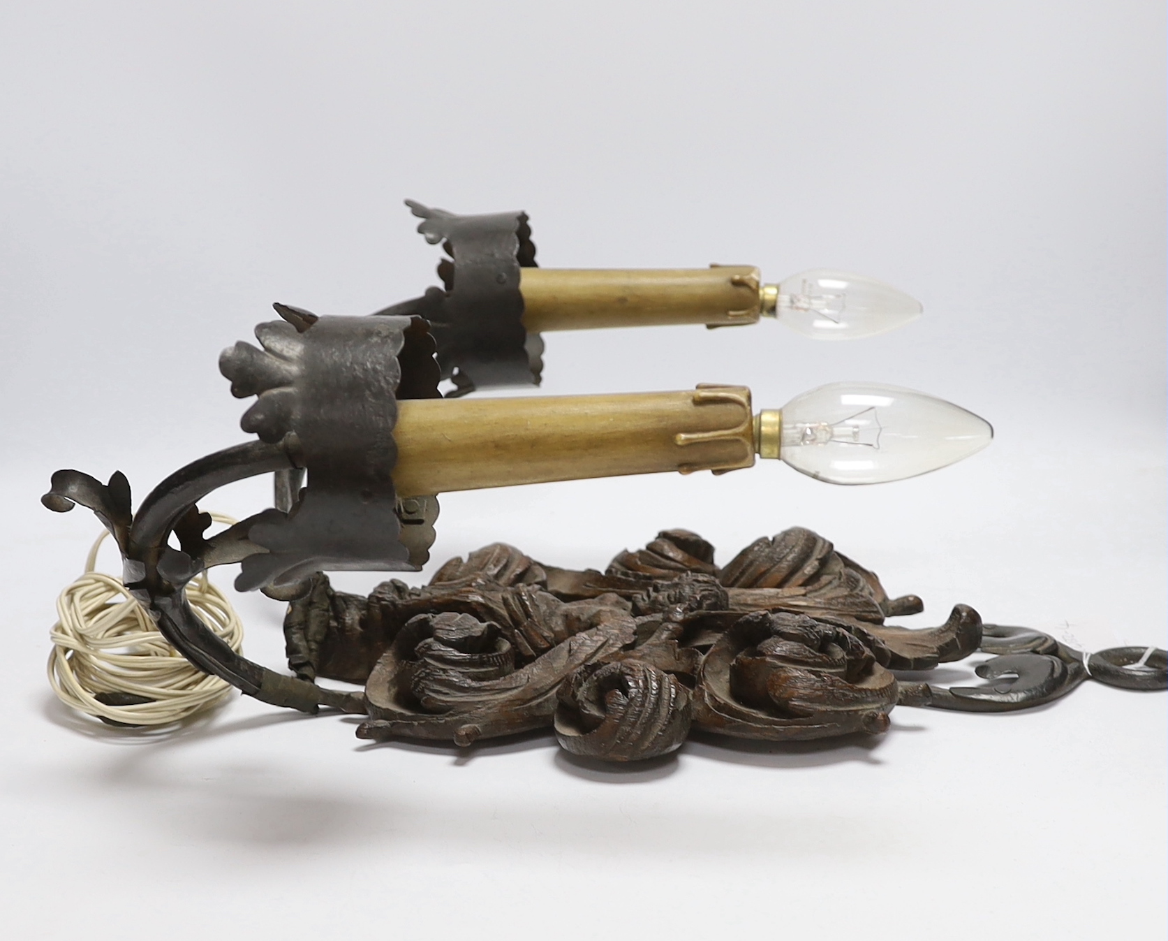 A 19th century carved wood mounted two branch wall light.